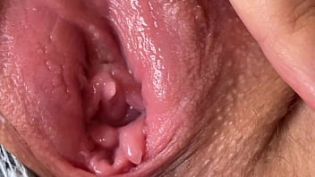 Strenuous close-up of a nubile girl's raw and luscious vagina as she prepares for foray